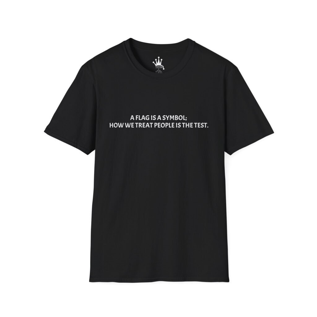A FLAG IS A SYMBOL; HOW WE TREAT PEOPLE IS THE TEST. Graphic Tee Black